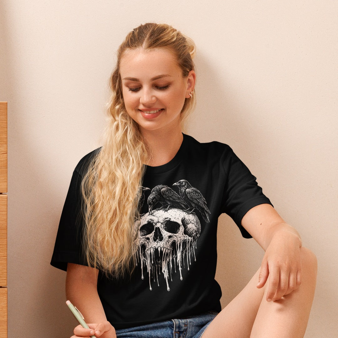 Blonde woman wearing the Melting Skull & Ravens Tee in black
